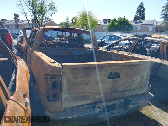 2018 Chevrolet Silverado 1500 LT with VIN 3GCPCREC1JG269974, listed as a IAAI auction lot 39059406 with Not Provided miles and . Bid and sale history available at DreamBid. Image 3.