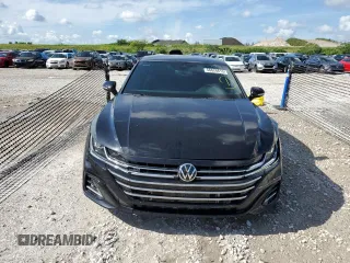 2023 Volkswagen Arteon SEL R-Line с VIN WVWSR7AN6PE002608, выставлен на аукционе Copart как лот 56626613 с пробегом 7 358 миль миль и . История ставок и продаж доступна на DreamBid. Изображение 5.