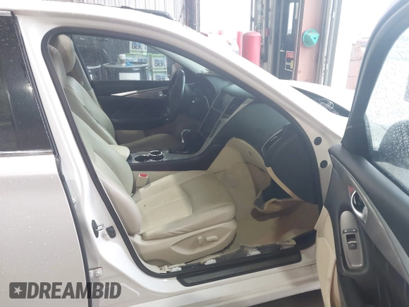 2014 Infiniti Q50 Premium z VIN JN1BV7AP5EM692015, wystawiony jako IAAI lot #42412718 z przebiegiem 202 124 mil mil oraz . Historia ofert i sprzedaży dostępna na DreamBid. Obrazek 5.