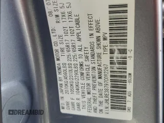 2007 Honda CR-V EX-L z VIN JHLRE38797C082267, wystawiony jako Copart lot #57602825 z przebiegiem 160 217 mil mil oraz Szkoda całkowita • Salvage title. Historia ofert i sprzedaży dostępna na DreamBid. Obrazek 13.