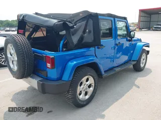 2015 Jeep Wrangler Unlimited Altitude с VIN 1C4HJWEG3FL528051, выставлен на аукционе IAAI как лот 42388844 с пробегом 87 596 миль миль и . История ставок и продаж доступна на DreamBid. Изображение 4.
