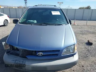 2000 Toyota Sienna LE with VIN 4T3ZF13C3YU220127, listed as a IAAI auction lot 41885903 with 168,765 mi miles. Bid and sale history available at carsss.com. Image 12.