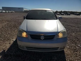 2006 Suzuki Forenza Premium z VIN KL5JJ56Z36K268290, wystawiony jako Copart lot #88509495 z przebiegiem 199 303 mil mil oraz Szkody całkowita. Historia ofert i sprzedaży dostępna na DreamBid. Obrazek 5.