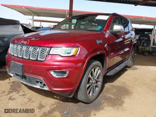 2018 Jeep Grand Cherokee Overland with VIN 1C4RJFCG1JC173042, listed as a IAAI auction lot 41705160 with 64,949 mi miles. Bid and sale history available at carsss.com. Image 17.