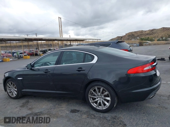 2013 Jaguar XF I4 RWD with VIN SAJWA0ES0DPS64027, listed as a IAAI auction lot 41569121 with 103,115 mi miles. Bid and sale history available at carsss.com. Image 14.