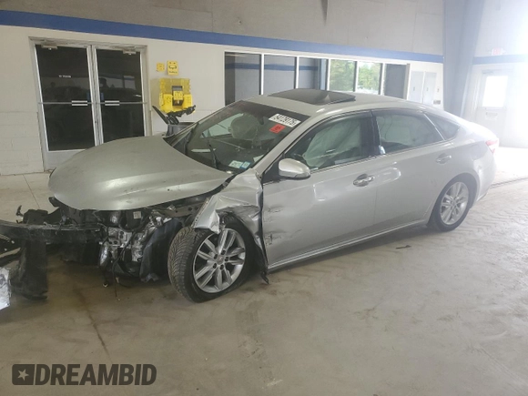 2013 Toyota Avalon XLE with VIN 4T1BK1EB0DU001291, listed as a Copart auction lot 54129175 with 107,242 mi miles and Salvage Title. Bid and sale history available at DreamBid. Image 1.