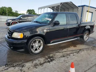 2001 Ford F-150 XLT with VIN 1FTRW07L51KA31353, listed as a Copart auction lot 59724275 with Not provided miles and Salvage title. Bid and sale history available at DreamBid. Image 1.