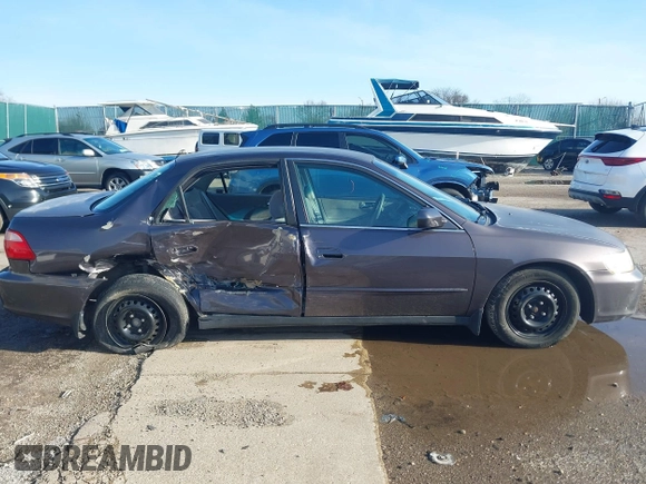 1998 Honda Accord LX z VIN 1HGCG5642WA046417, wystawiony jako IAAI lot #41945037 z przebiegiem Nie podano mil oraz . Historia ofert i sprzedaży dostępna na DreamBid. Obrazek 13.