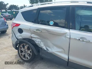 2014 Ford Escape Titanium с VIN 1FMCU0J91EUD93260, выставлен на аукционе IAAI как лот 42495051 с пробегом 97 164 миль миль и . История ставок и продаж доступна на DreamBid. Изображение 13.