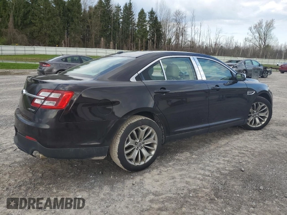 2014 Ford Taurus Limited z VIN 1FAHP2F85EG151167, wystawiony jako Copart lot #54376275 z przebiegiem 136 612 mil mil oraz Szkody całkowita. Historia ofert i sprzedaży dostępna na DreamBid. Obrazek 3.