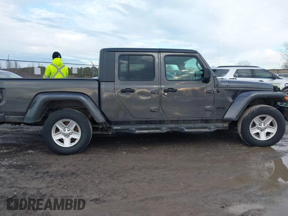 2021 Jeep Gladiator Willys with VIN 1C6HJTAGXML502037, listed as a IAAI auction lot 41225448 with 53,154 mi miles and . Bid and sale history available at carsss.com. Image 14.