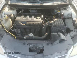 2008 Chrysler Sebring LX z VIN 1C3LC46K48N167789, wystawiony jako Copart lot #57791965 z przebiegiem 152 080 mil mil oraz Szkoda całkowita • Salvage title. Historia ofert i sprzedaży dostępna na DreamBid. Obrazek 11.