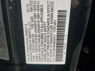 2025 Honda Pilot EX-L with VIN 5FNYG2H48SB006313, listed as a Copart auction lot 82039054 with 10,402 mi miles and Salvage Title. Bid and sale history available at carsss.com. Image 15.