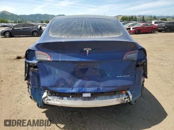 2021 Tesla Model Y Long Range with VIN 5YJYGDEE7MF114420, listed as a Copart auction lot 53889365 with 74,363 mi miles and Salvage Title. Bid and sale history available at DreamBid. Image 6.
