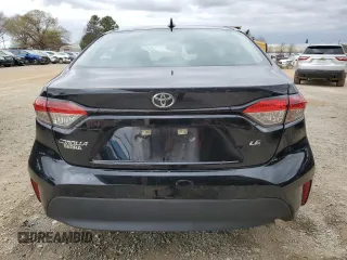 2023 Toyota Corolla LE with VIN 5YFB4MDE0PP070916, listed as a Copart auction lot 49873085 with 52,005 mi miles and Salvage Title. Bid and sale history available at carsss.com. Image 6.