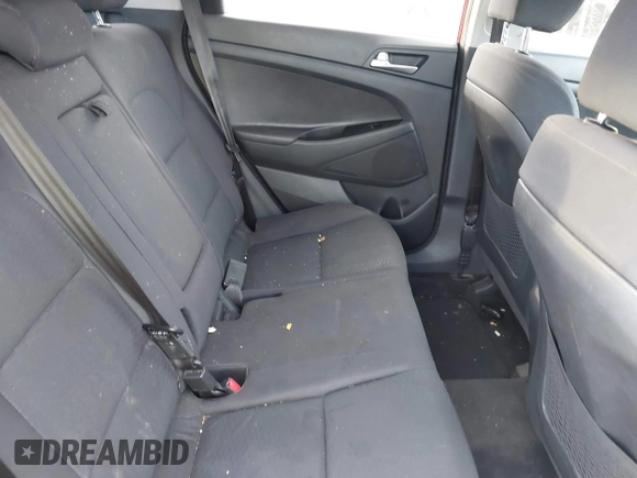 2019 Hyundai Tucson SE with VIN KM8J2CA49KU881841, listed as a IAAI auction lot 41099575 with 129,153 mi miles. Bid and sale history available at carsss.com. Image 8.