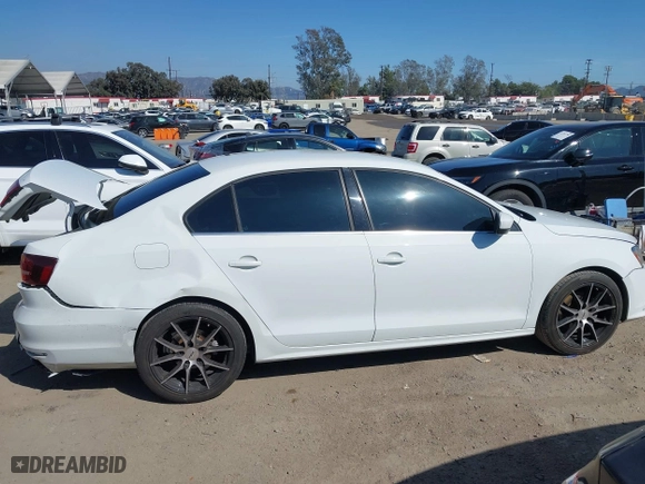 2017 Volkswagen Jetta 1.4T S with VIN 3VW167AJ5HM282077, listed as a IAAI auction lot 41840217 with 94,804 mi miles. Bid and sale history available at carsss.com. Image 13.