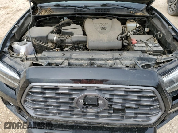 2021 Toyota Tacoma SR z VIN 5TFCZ5AN1MX256607, wystawiony jako Copart lot #52182225 z przebiegiem 44 717 mil mil oraz Szkoda całkowita • Salvage title. Historia ofert i sprzedaży dostępna na DreamBid. Obrazek 11.
