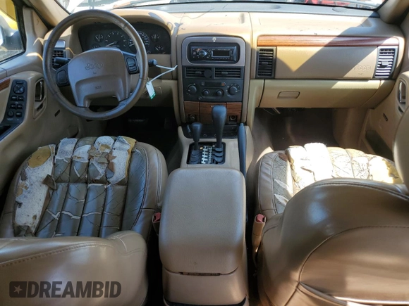 1999 Jeep Grand Cherokee Limited with VIN 1J4GW68N7XC581404, listed as a Copart auction lot 51533715 with 27,190 mi miles and Salvage Title. Bid and sale history available at carsss.com. Image 8.