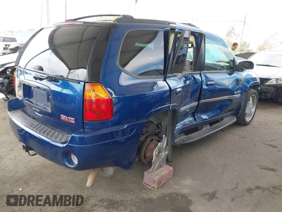 2006 GMC Envoy SLE with VIN 1GKDS13S562252049, listed as a IAAI auction lot 41940052 with 149,445 mi miles. Bid and sale history available at carsss.com. Image 4.
