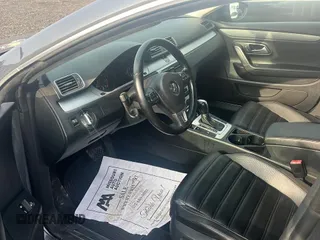 2013 Volkswagen CC R-Line with VIN WVWBP7AN1DE571321, listed as a Copart auction lot 70648784 with 122,061 mi miles and Clean Title. Bid and sale history available at carsss.com. Image 9.
