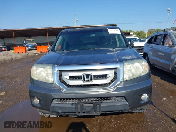 2010 Honda Pilot Touring with VIN 5FNYF3H87AB006023, listed as a IAAI auction lot 40310546 with 135,482 mi miles and . Bid and sale history available at carsss.com. Image 12.
