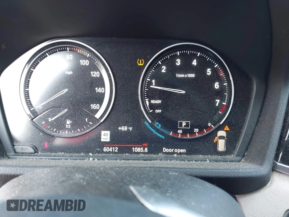 2021 BMW X1 xDrive28i with VIN WBXJG9C02M3M42379, listed as a IAAI auction lot 42476221 with 60,412 mi miles and . Bid and sale history available at DreamBid. Image 7.