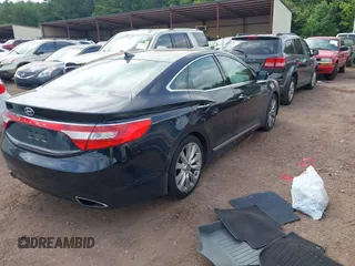 2012 Hyundai Azera z VIN KMHFH4JG2CA174846, wystawiony jako IAAI lot #42477082 z przebiegiem 73 371 mil mil oraz . Historia ofert i sprzedaży dostępna na DreamBid. Obrazek 4.