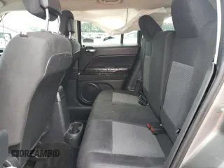 2014 Jeep Patriot Latitude z VIN 1C4NJRFB7ED501578, wystawiony jako Copart lot #63308005 z przebiegiem 76 100 mil mil oraz Szkoda całkowita • Salvage title. Historia ofert i sprzedaży dostępna na DreamBid. Obrazek 11.