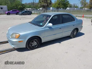 2005 Hyundai Accent GLS с VIN KMHCG45C55U614718, выставлен на аукционе IAAI как лот 41787587 с пробегом 135 448 миль миль и . История ставок и продаж доступна на DreamBid. Изображение 2.