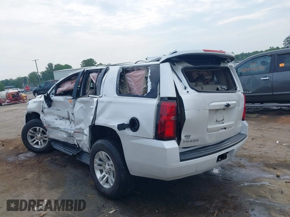 2019 Chevrolet Tahoe LT with VIN 1GNSKBKC3KR144850, listed as a IAAI auction lot 42420199 with Not provided miles and . Bid and sale history available at DreamBid. Image 3.