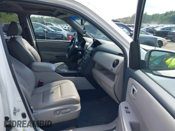 2013 Honda Pilot EX-L with VIN 5FNYF4H63DB077552, listed as a IAAI auction lot 42483801 with 218,823 mi miles and . Bid and sale history available at DreamBid. Image 5.