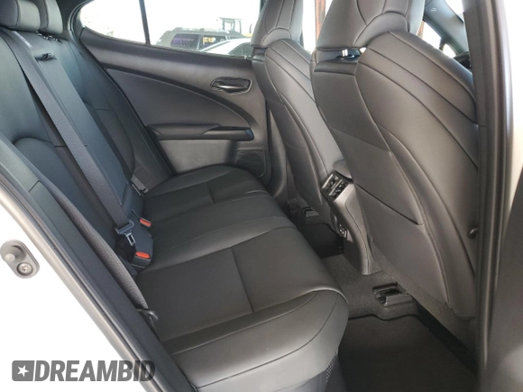2023 Lexus UX 250h F Sport с VIN JTHR6JBH2P2150820, выставлен на аукционе Copart как лот 77956114 с пробегом 9 422 миль миль и Списание • Salvage title. История ставок и продаж доступна на DreamBid. Изображение 11.