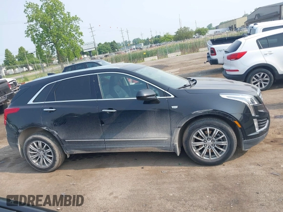 2018 Cadillac XT5 Luxury AWD with VIN 1GYKNDRSXJZ247863, listed as a IAAI auction lot 42392404 with 96,629 mi miles and . Bid and sale history available at DreamBid. Image 13.