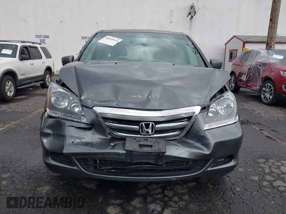 2007 Honda Odyssey EX-L z VIN 5FNRL386X7B445642, wystawiony jako IAAI lot #40652844 z przebiegiem 202 622 mil mil oraz . Historia ofert i sprzedaży dostępna na DreamBid. Obrazek 12.