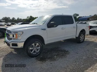 2018 Ford F-150 XL with VIN 1FTEW1E59JFA28036, listed as a Copart auction lot 57181525 with 121,384 mi miles and Salvage title. Bid and sale history available at DreamBid. Image 1.