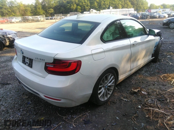 2016 BMW 2 Series 228i xDrive with VIN WBA1G9C55GV726460, listed as a IAAI auction lot 39985264 with 48,379 mi miles. Bid and sale history available at carsss.com. Image 4.