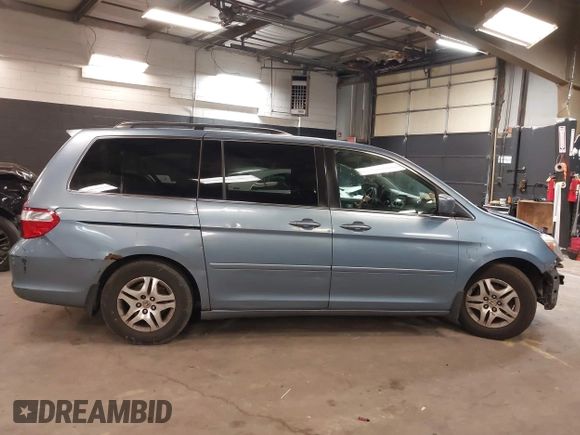 2007 Honda Odyssey EX-L with VIN 5FNRL38687B102568, listed as a IAAI auction lot 41991054 with 243,896 mi miles. Bid and sale history available at carsss.com. Image 13.