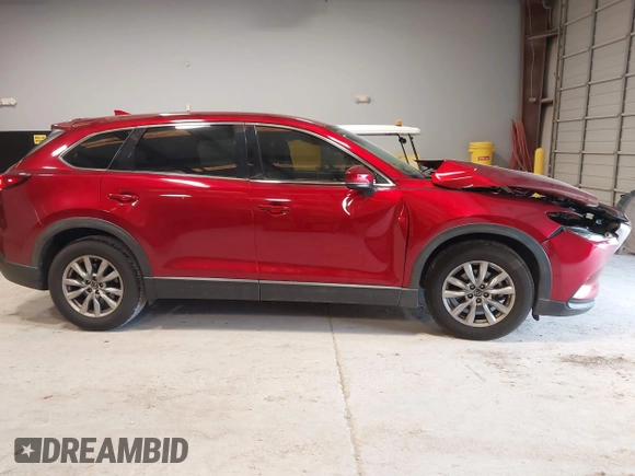 2019 Mazda CX-9 Touring with VIN JM3TCACY1K0331904, listed as a IAAI auction lot 42146945 with 77,699 mi miles and . Bid and sale history available at DreamBid. Image 13.