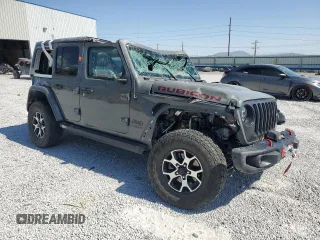 2020 Jeep Wrangler Unlimited Rubicon with VIN 1C4HJXFG4LW334160, listed as a Copart auction lot 59486435 with Not provided miles and Salvage title. Bid and sale history available at DreamBid. Image 4.