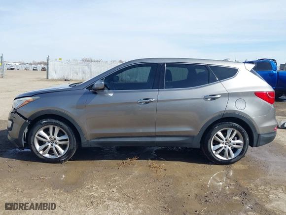 2013 Hyundai Santa Fe 2.0T Sport with VIN 5XYZWDLA1DG003779, listed as a IAAI auction lot 41761431 with 127,895 mi miles. Bid and sale history available at carsss.com. Image 14.