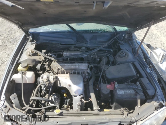 2001 Toyota Camry CE z VIN JT2BG22K410568101, wystawiony jako Copart lot #57184125 z przebiegiem Nie podano mil oraz Szkoda całkowita • Salvage title. Historia ofert i sprzedaży dostępna na DreamBid. Obrazek 11.