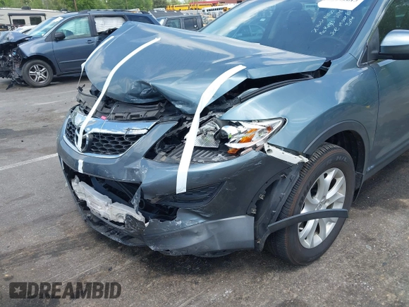 2012 Mazda CX-9 Touring z VIN JM3TB3CV0C0352698, wystawiony jako IAAI lot #42092613 z przebiegiem 75 118 mil mil oraz . Historia ofert i sprzedaży dostępna na DreamBid. Obrazek 6.