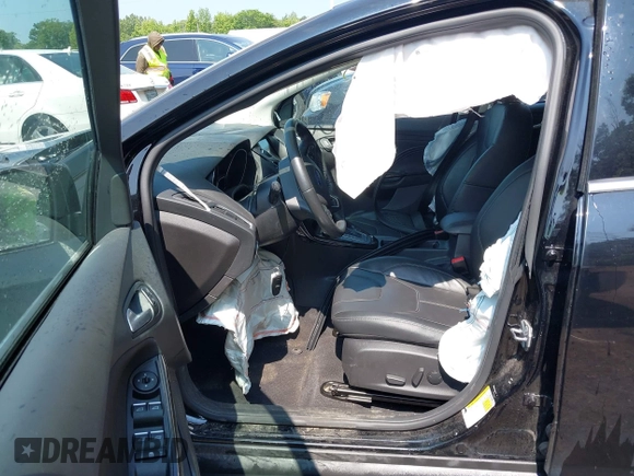 2018 Ford Focus Titanium with VIN 1FADP3J22JL220986, listed as a IAAI auction lot 42410253 with 40,791 mi miles and . Bid and sale history available at DreamBid. Image 5.