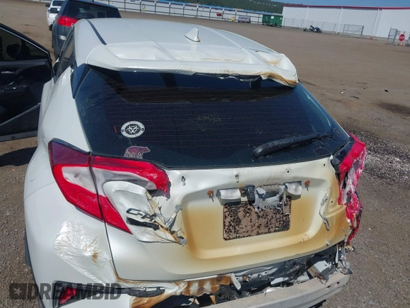 2018 Toyota C-HR XLE z VIN NMTKHMBXXJR041817, wystawiony jako IAAI lot #42174035 z przebiegiem 86 669 mil mil oraz . Historia ofert i sprzedaży dostępna na DreamBid. Obrazek 14.