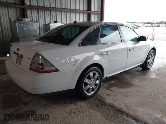 2008 Ford Taurus Limited with VIN 1FAHP25W58G138858, listed as a IAAI auction lot 42202399 with Not Provided miles and . Bid and sale history available at DreamBid. Image 4.