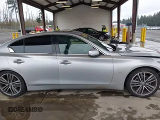 2014 Infiniti Q50 Sport with VIN JN1BV7APXEM670849, listed as a IAAI auction lot 41939363 with 124,766 mi miles and . Bid and sale history available at DreamBid. Image 13.