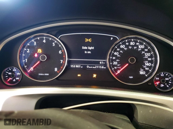 2014 Volkswagen Touareg Lux z VIN WVGEF9BP9ED014963, wystawiony jako Copart lot #50555345 z przebiegiem 153 907 mil mil oraz Szkoda całkowita • Salvage title. Historia ofert i sprzedaży dostępna na DreamBid. Obrazek 9.