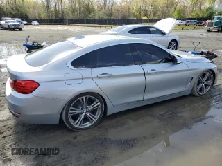 2016 BMW 4 Series 428i with VIN WBA4A9C58GGL89883, listed as a Copart auction lot 52114415 with 132,796 mi miles and Salvage Title. Bid and sale history available at carsss.com. Image 3.