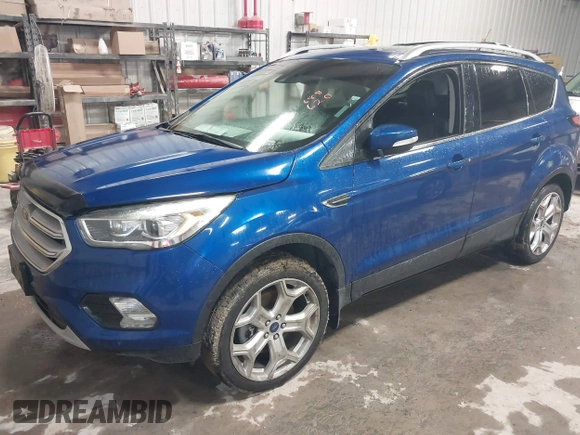 2018 Ford Escape Titanium with VIN 1FMCU9J99JUB94925, listed as a IAAI auction lot 42412800 with 95,880 mi miles and . Bid and sale history available at DreamBid. Image 18.